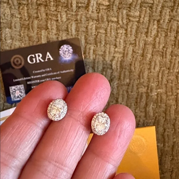 Two ct. Moissanite Oval earrings set in sterling silver $270 with GRA & COA NEW